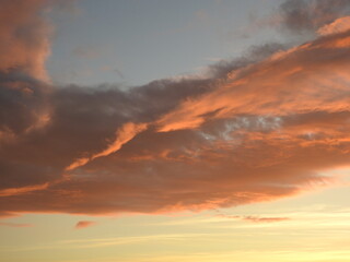Fototapeta premium Sunset over the bay and a large artistic cloud