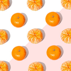 Fruit pattern  mandarins isolated on blue or mint background, top view.