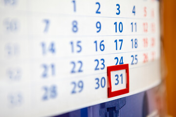The December, 31, 2020, paper calendar with red frame for date, close up view