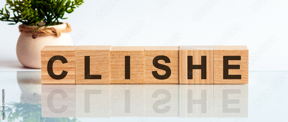 Poster clishe - text on wooden cubes on a white gradient background