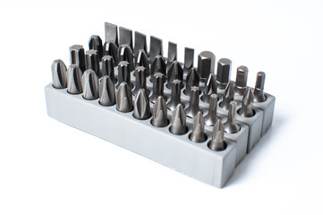Fototapeta premium Set of heads for screwdriver in grey box isolated on white background