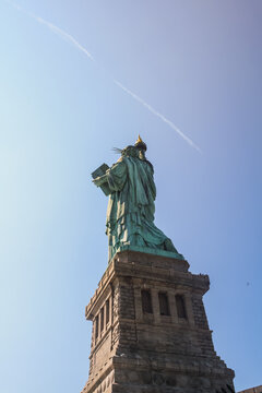 Image of the statue of liberty from the back. NYC, United States of America.