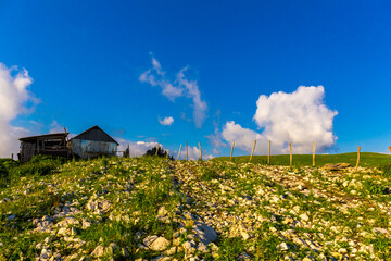 Scenery mountain landscape at Caucasus mountains with old hut