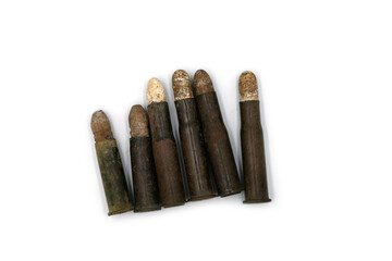 vintage rifle cartridges with lead bullet on white background