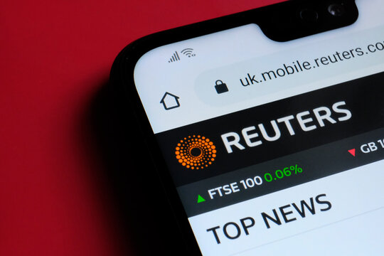 Stone / UK - July 14 2020: Reuters news agency website seen on the corner of mobile phone.