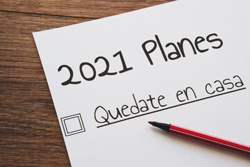 planner of goals and plans for 2021, a sheet of paper with the inscription stay home in english from to do list, quarantine and self-isolation concept