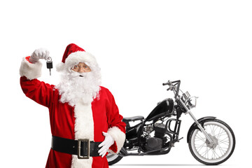 Santa Claus with a chopper motorbike holding keys in front of camera