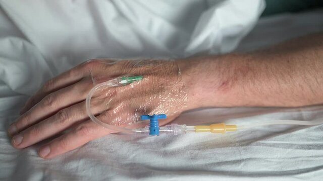Close up of an intravenous cannula in hand