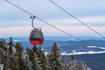 Gondolas of ski flit in Beskid Sadecki mountain range
