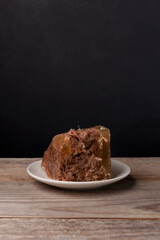 Beef jelly or aspic on dark background with copy space. Rustic style