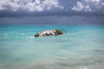 Half sunken yacht on the island of Saona. Dominican Republic, Beach on Saona island.
