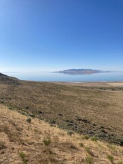 view of a lake from the hill