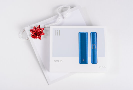 lil SOLID - new by IQOS - Electric Tobacco Heating System. Electronic Cigarette Technology, alternative smoking.