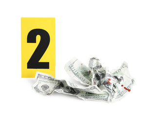 Bloody crumpled dollars and crime scene marker with number two isolated on white