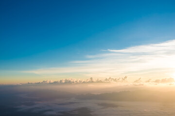 Fototapeta na wymiar Mountain sunrise visible silhouettes through the morning