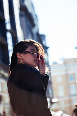 Fototapeta premium young pretty asian girl outside on big city street, lifestyle people concept