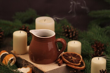 Obraz na płótnie Canvas Christmas photos, coffee with cinnamon, New Year's atmosphere, holiday, New Year's holidays. New Year's atmosphere, New Year's layouts, candles, Christmas candle
