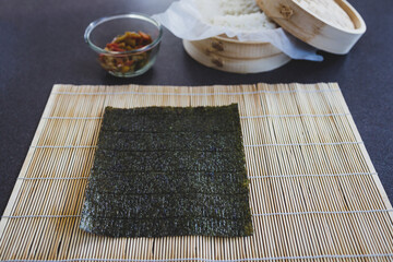 plant-based food, homemade vegan sushi with stir fried vegetable filling getting prepared