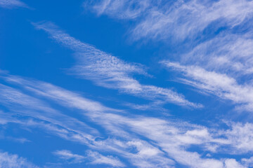White clouds in a blue sky.