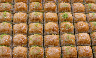 Traditional Turkish dessert Baklava on the stall. Sweets for iftar.
