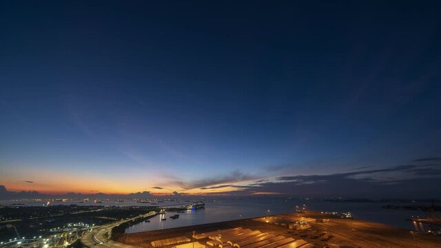 4K Time lapse Video of sunrise at Singapore strait