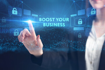 Business, Technology, Internet and network concept. Young businessman working on a virtual screen of the future and sees the inscription: Boost your business