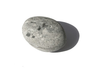 Natural pebbles on white background