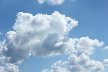 bright cumulus cloud and blue sky