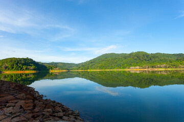 Beautiful landscape of Mountain and Lake with reflex in the water scenery beautiful view with blue sky and white clouds in phuket thailand