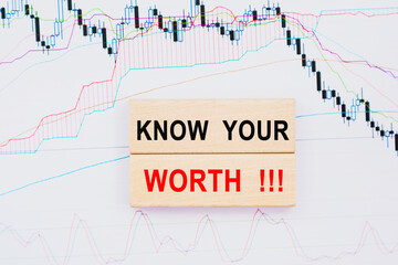 KNOW YOUR WORTH text on paper sheet with chart- business, banking, finance and investment concept