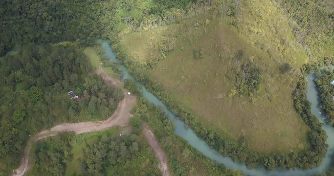 Drone aerial bird's-eye view of river Cahabon near Semuc Champey area in Lanquin, Guatemala