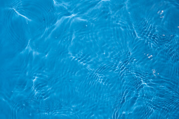 Fototapeta na wymiar Water Surface Top View,Water in swimming pool rippled water detail background