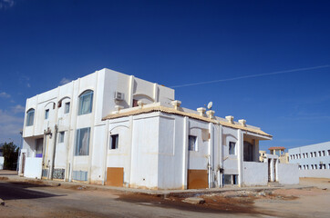 Residential non tourist area. White apartment buildings. Sharm El Sheikh, Egypt 