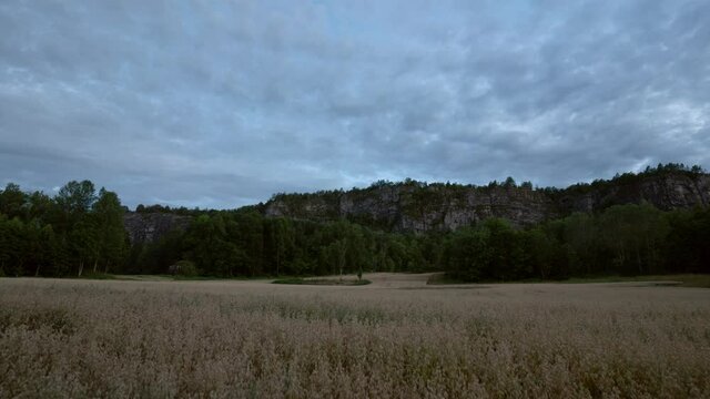 Time lapse footage of clouds moving over the cornfield. Southern Norway