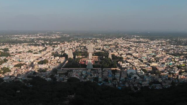 Top Aerial View Of Tiruvannamalai Shiva Temple In India during beautiful lighting day.Slow forward shot.