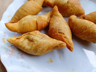 Pisang Molen is a light banana-based dish that serves rolled sheets of pastry dough and then fried in oil.