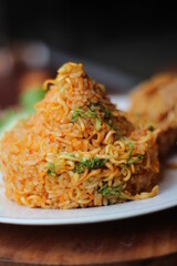 Indonesia Traditional Spicy Fried Rice with fried chicken