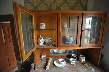Old cupboard in abandoned village of Chernobyl zone