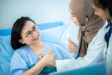 senior woman patient and young woman doctor, friendly doctor encouragement, empathy and support...