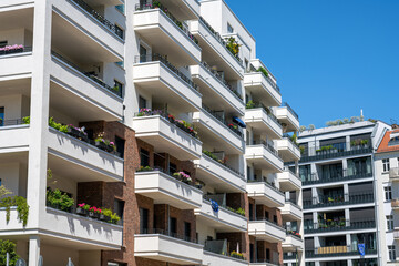 Facade of a modern apartment buildings with big balconies
