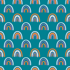 .Cute Boho rainbow on emerald background seamless pattern. Modern vector illustration for textiles, paper, printing design