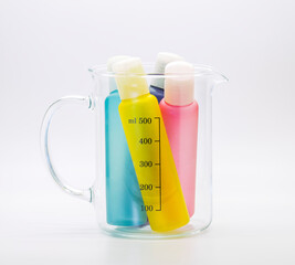 Various colored pastels in a clear beaker size 500cc for use in cosmetic items or experimental...
