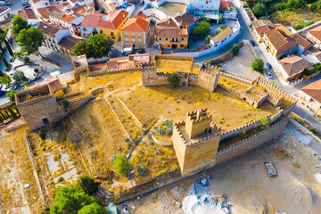 Scenic view from drone of historic fortified Moorish Castle in Spanish city of Guadix, Andalusia..