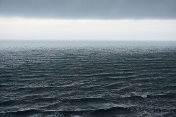Fototapeta na wymiar the surface of the Atlantic ocean in cloudy weather