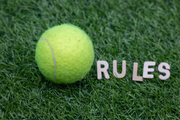 Tennis rule is on green grass