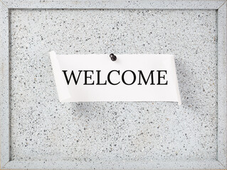 WELCOME text on notice board on top of office desk. Business finance meeting or workshop presentation and education concept. welcome and onboarding or induction. Copy space