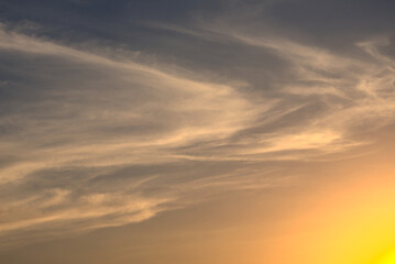 Naklejka na ściany i meble orange sunset, clouds, wind