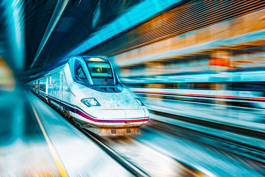 Modern hi-speed passenger train, in  movement (motion).