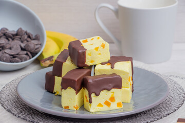 Banana bird milk with chunks of peach marmalade