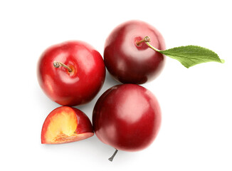 Fresh ripe plums isolated on white background